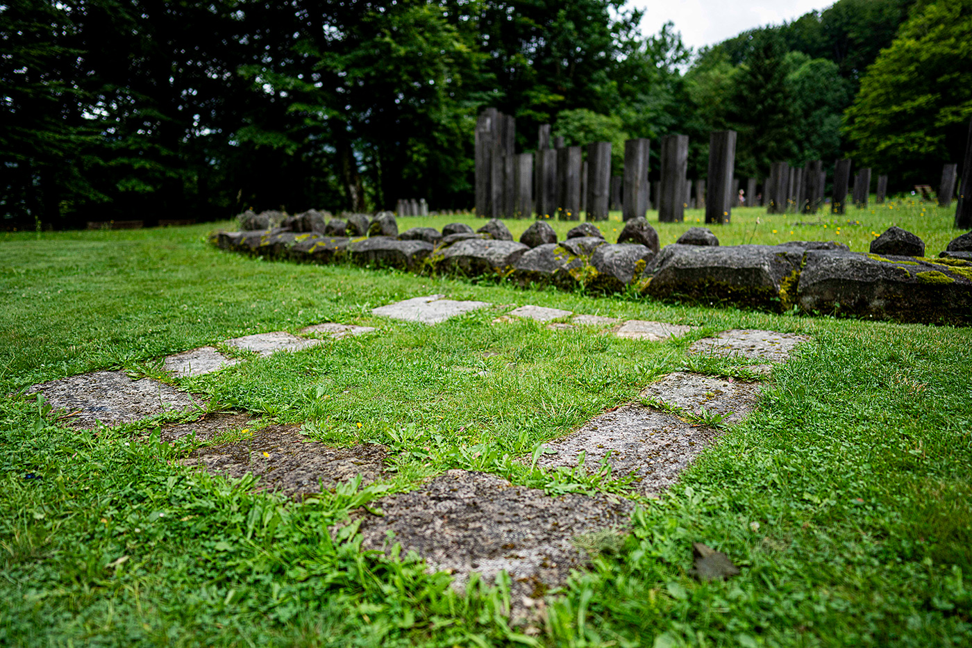 A close-up photo of some stones in a square near temple ruins