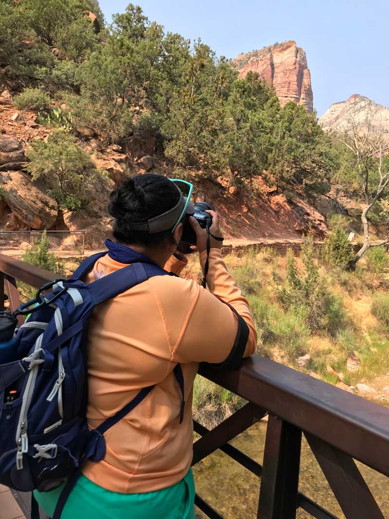 Kirstin taking photograph at Zion National Park.